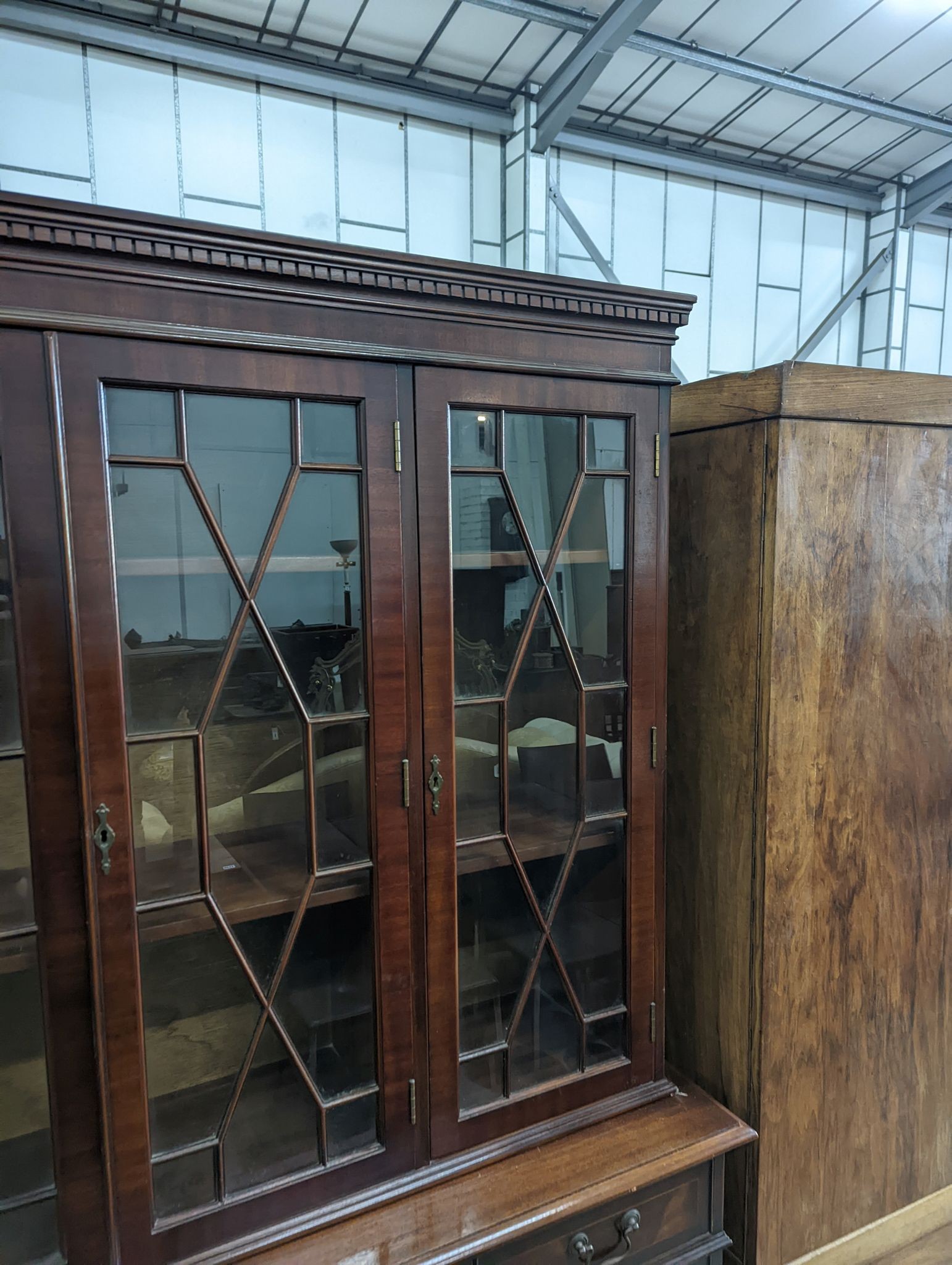 A reproduction George III style mahogany library bookcase, length 154cm, depth 41cm, height 193cm